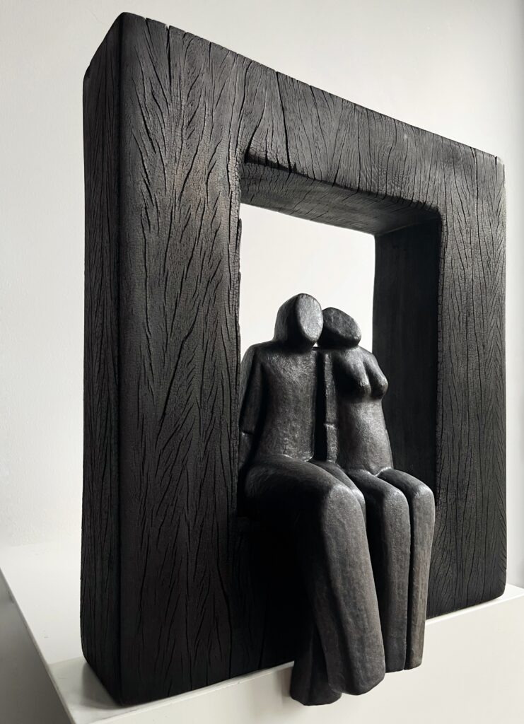 Het paar in zwart hout